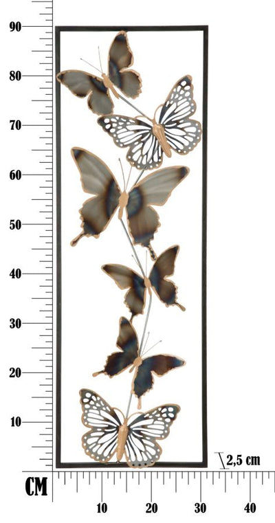 Décoration murale en forme de papillon métallique dans un cadre