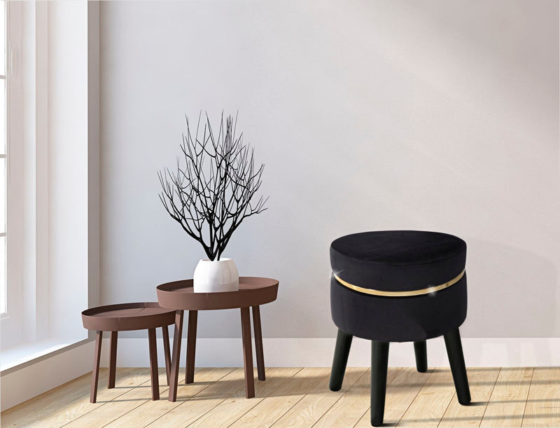 Tabouret rembourré en velours doré et noir