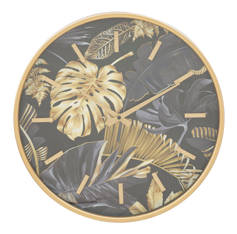 Horloge murale dorée et grise avec feuilles tropicales