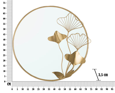 Miroir rond avec encadrement doré et motifs de feuilles et fleurs