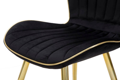 Chaise en velours noir avec pieds en métal doré