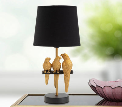 Lampe de table noire avec perroquets dorés