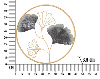 Décoration murale en forme de feuilles métalliques dans un cadre rond