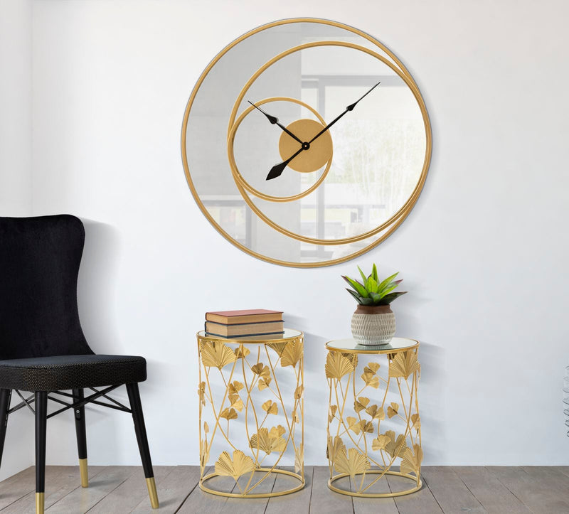 Horloge murale ronde en métal avec face miroir