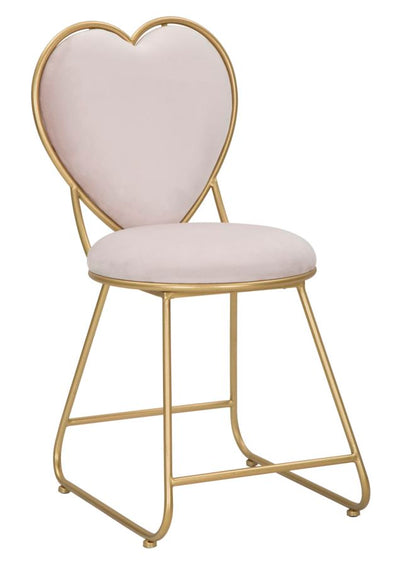 Chaise en velours rose en forme de cœur avec pieds en métal doré