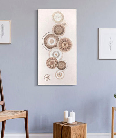 Peinture sur toile beige avec cercles géométriques