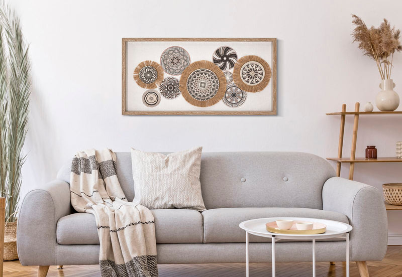 Peinture sur toile beige avec cercles géométriques