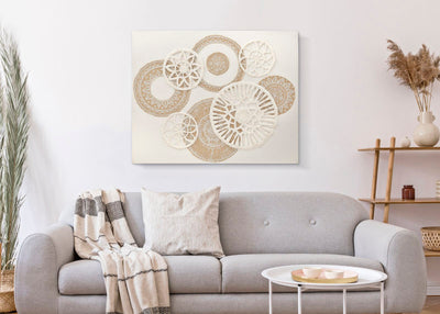 Peinture sur toile beige avec cercles géométriques