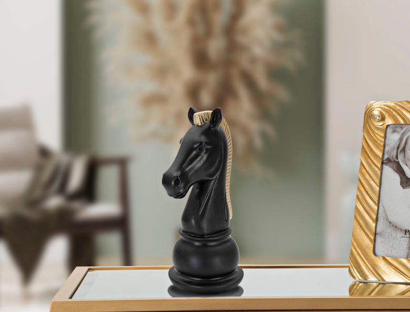 Pièce d’échecs en forme de cheval noir et doré (sculpture moderne)