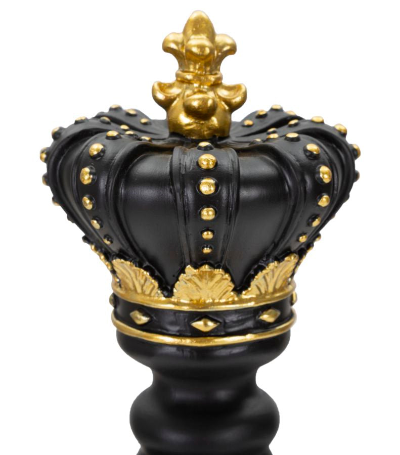 Pièce d’échecs du roi noir et dorée (sculpture moderne)