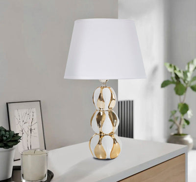 Lampe à poser triple boule en céramique blanche et dorée