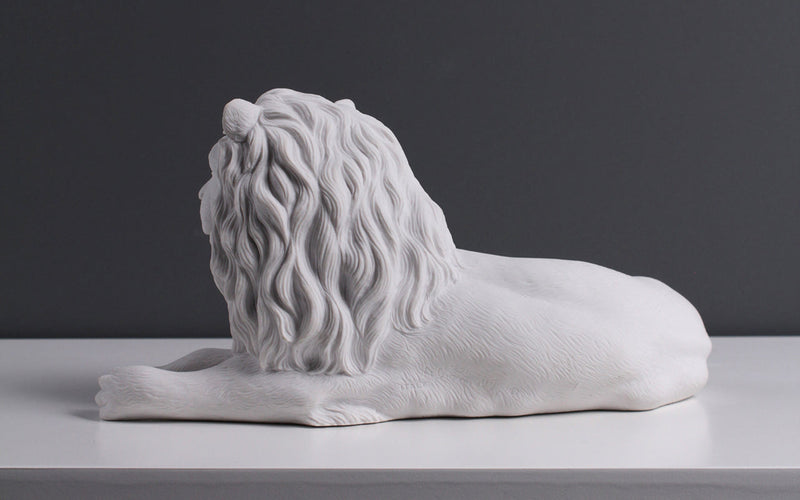 Statue de lion couché - sculpture en marbre