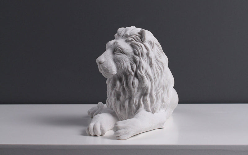 Statue de lion couché - sculpture en marbre