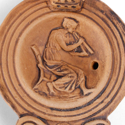 Lampe à huile avec dame romaine - céramique romaine